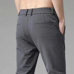 Men's charcoal dress pants with elastic waistband and zip fly