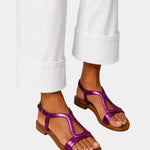 Fuchsia T-strap open-toe sandals with low block heel and ankle strap