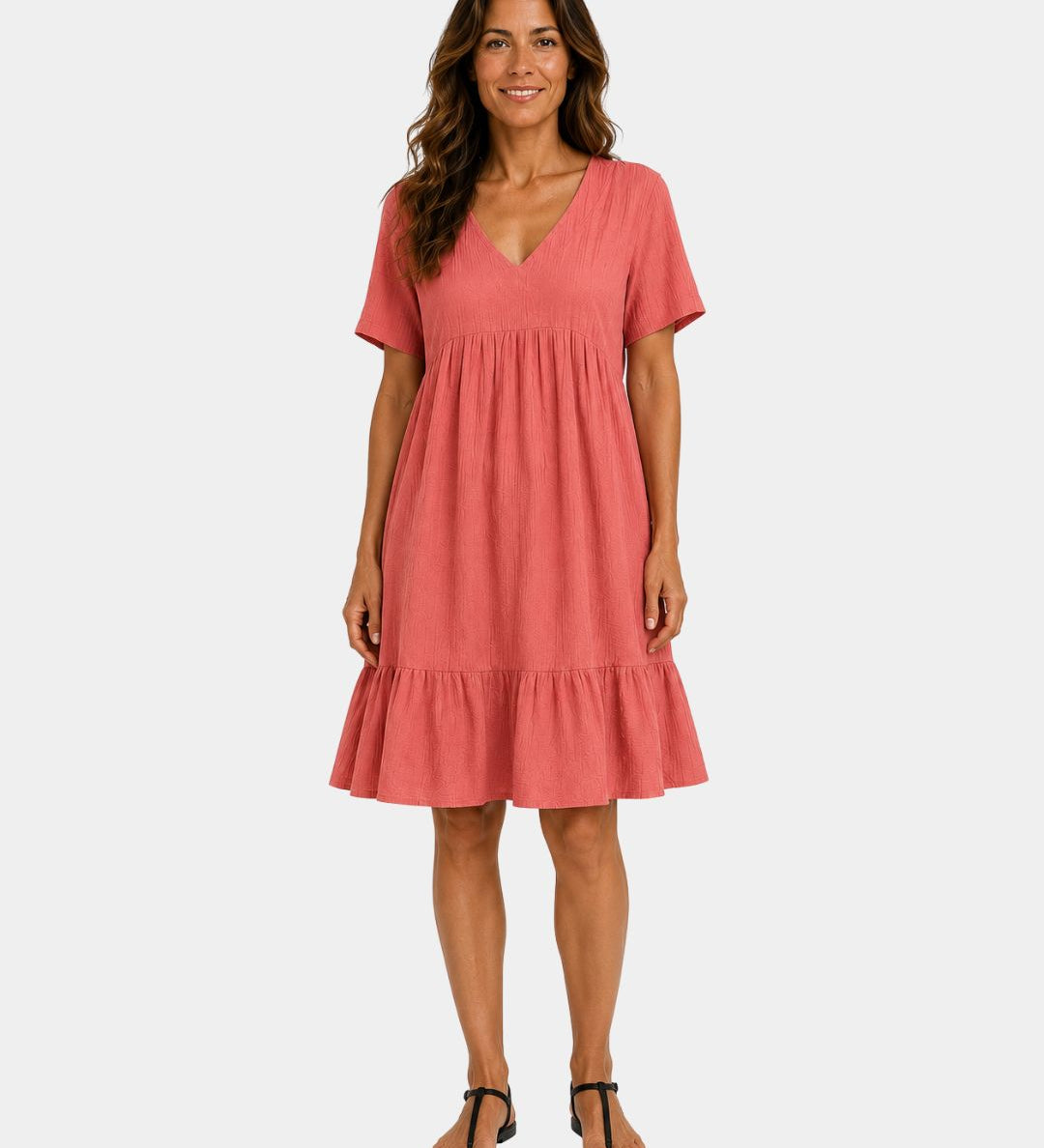 Light red textured V-neck midi dress with short sleeves and tiered skirt