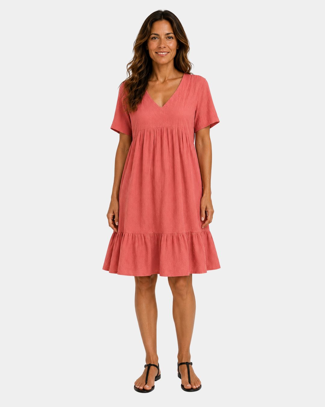 Light red textured V-neck midi dress with short sleeves and tiered skirt