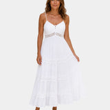Lightweight white maxi dress with spaghetti straps and tiered ruffle skirt