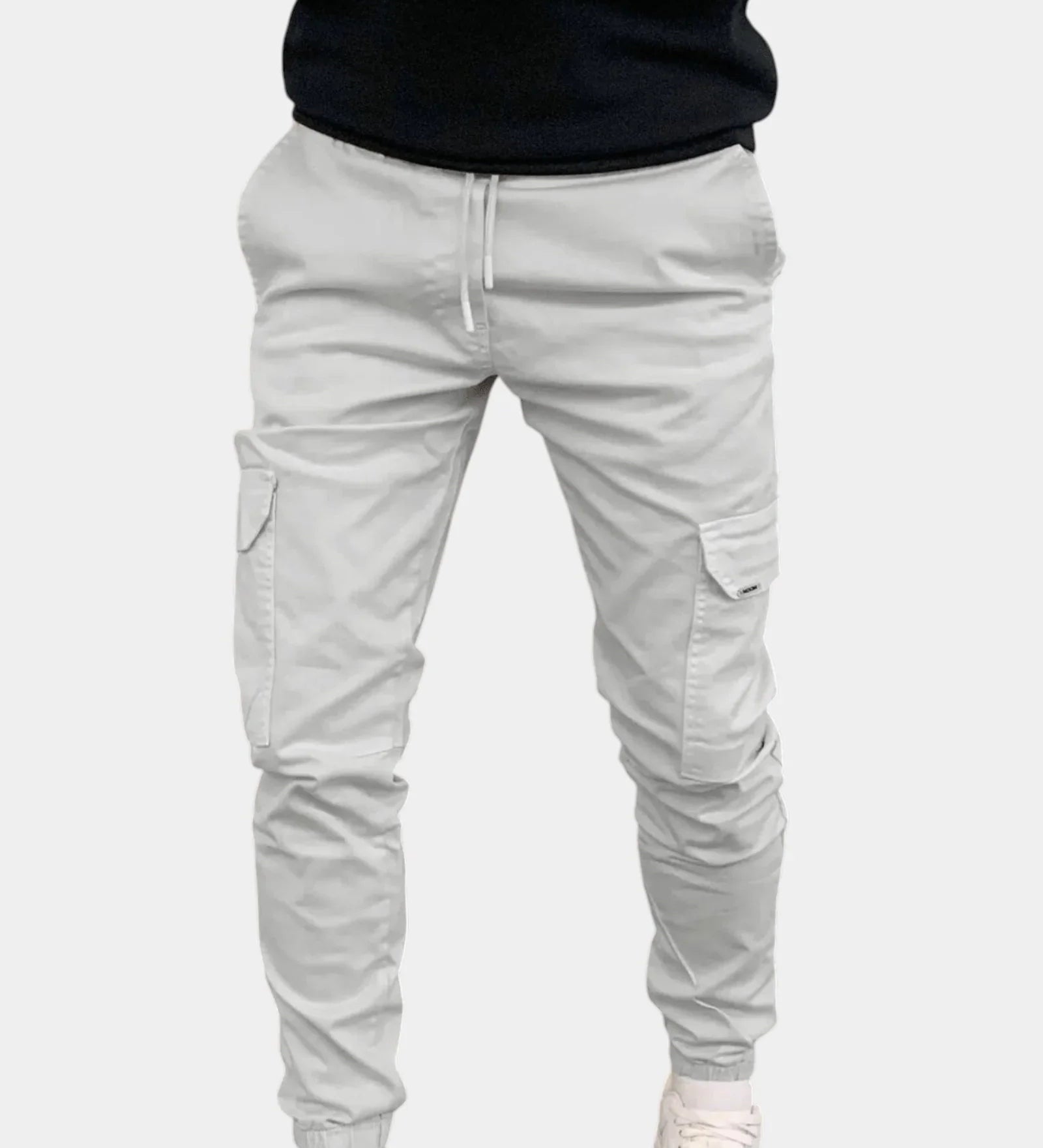 Light gray cargo jogger pants with drawstring waist, side cargo pockets, elastic cuffs.