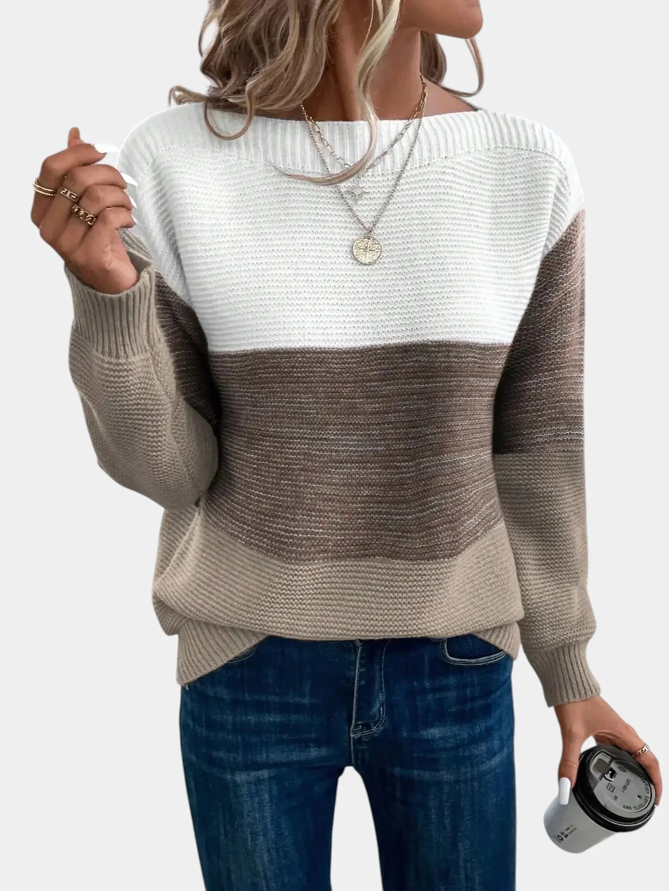Two-tone knit pullover with crew neck and long sleeves, white to dark gray gradient