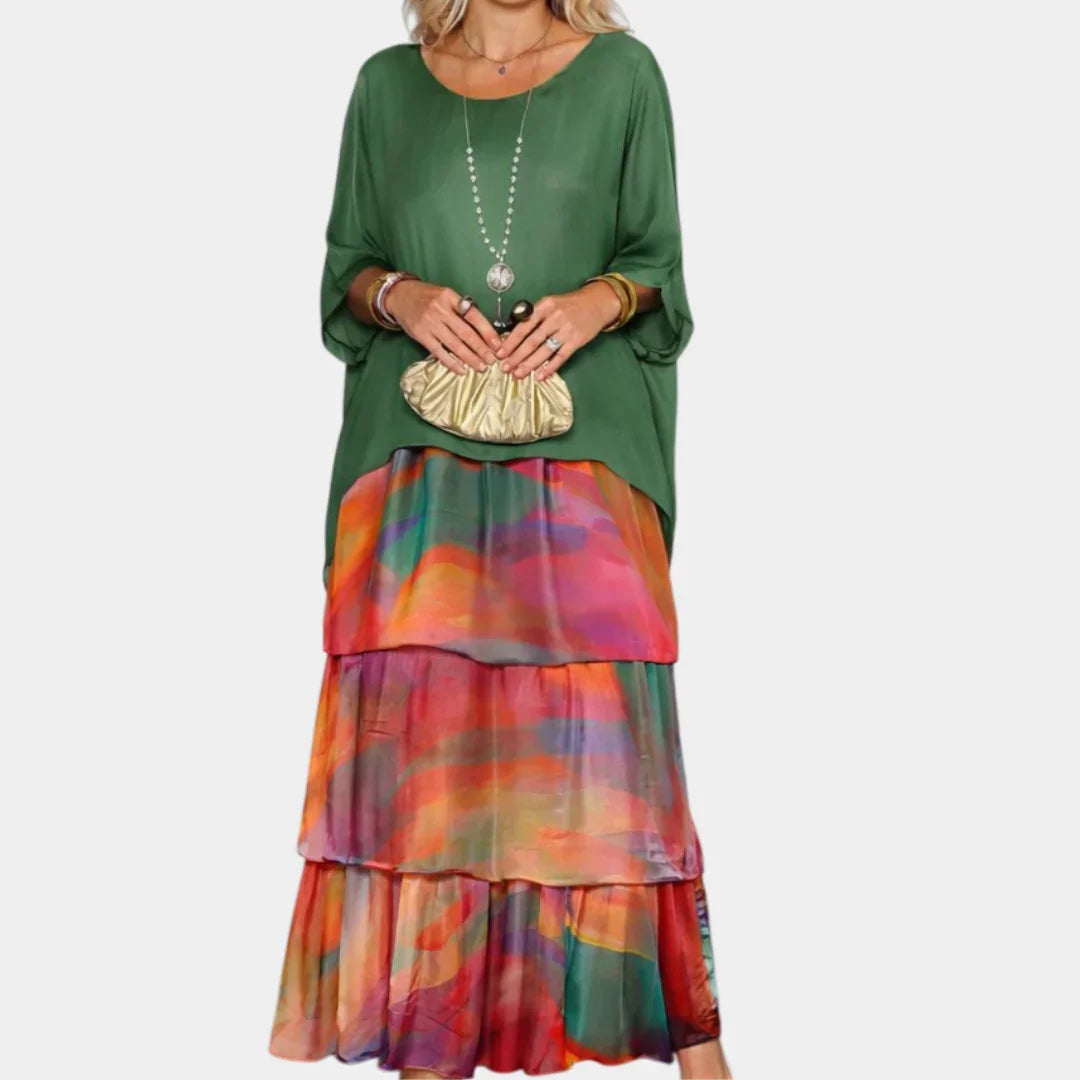Green tiered maxi dress with multicolor patterned ruffle skirt layers