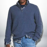 Blue knit quarter-zip sweater with ribbed cuffs and hem.