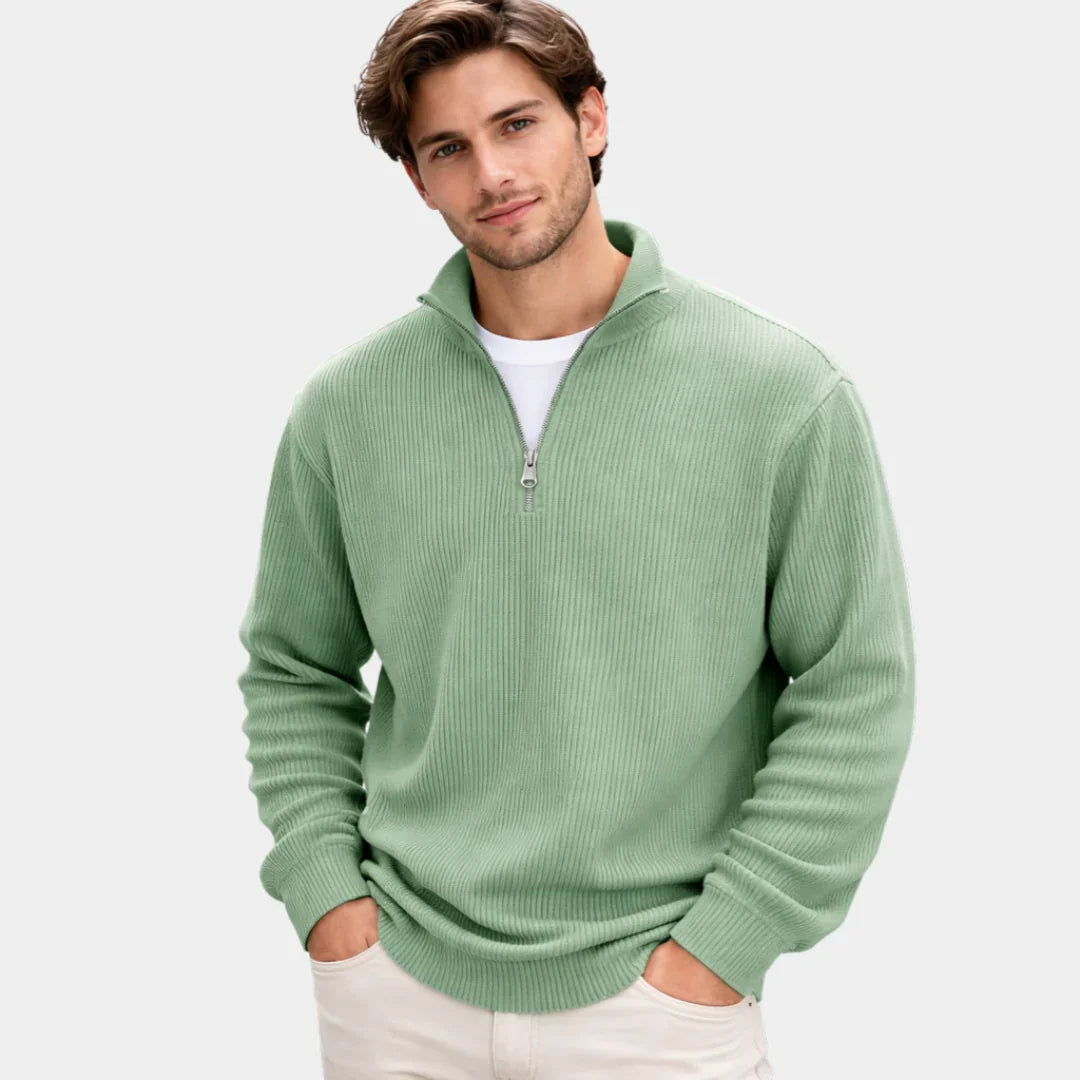 Green ribbed quarter-zip sweater with long sleeves and half-zip opening