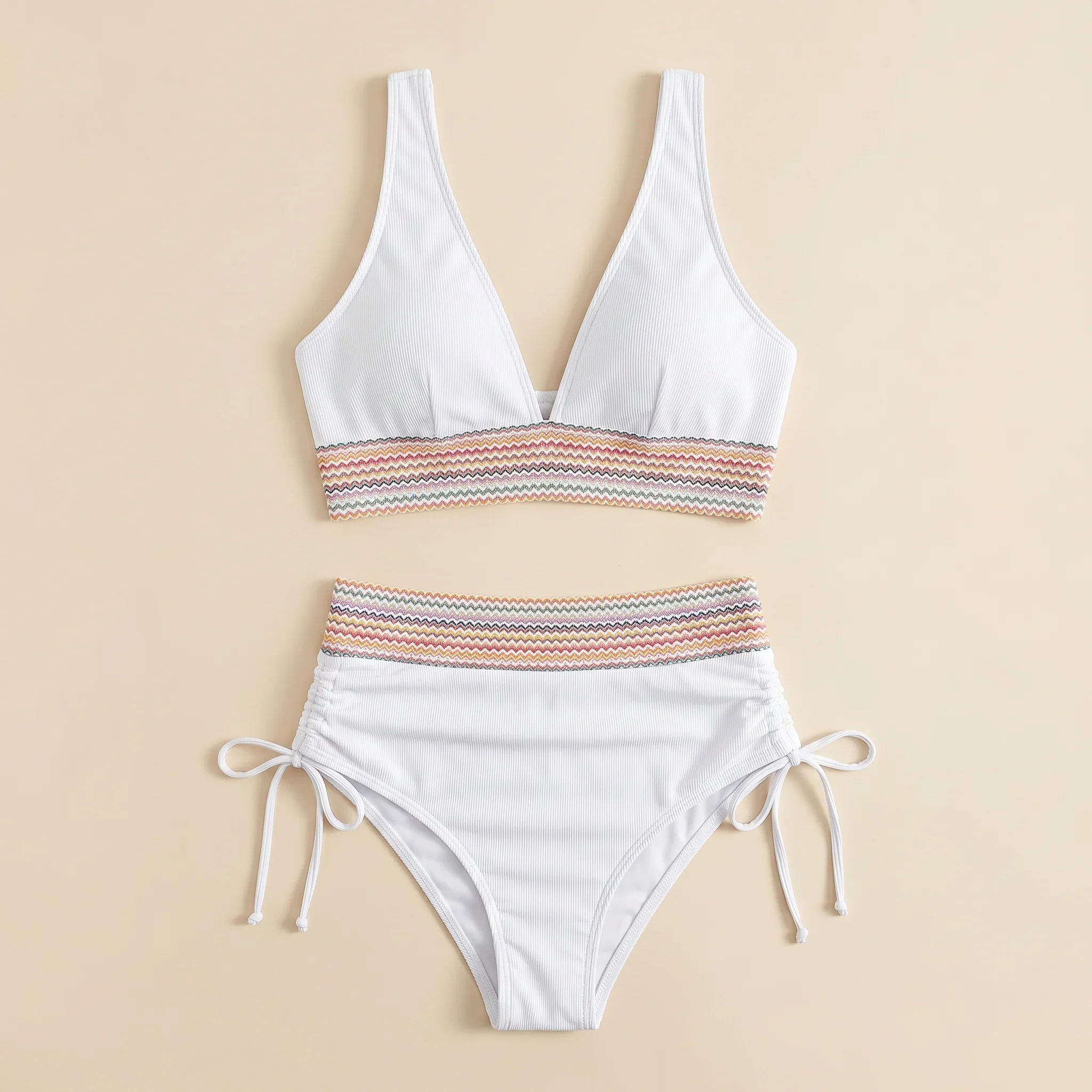 White two-piece swimsuit: V-neck top with striped band, tie-side bikini bottoms