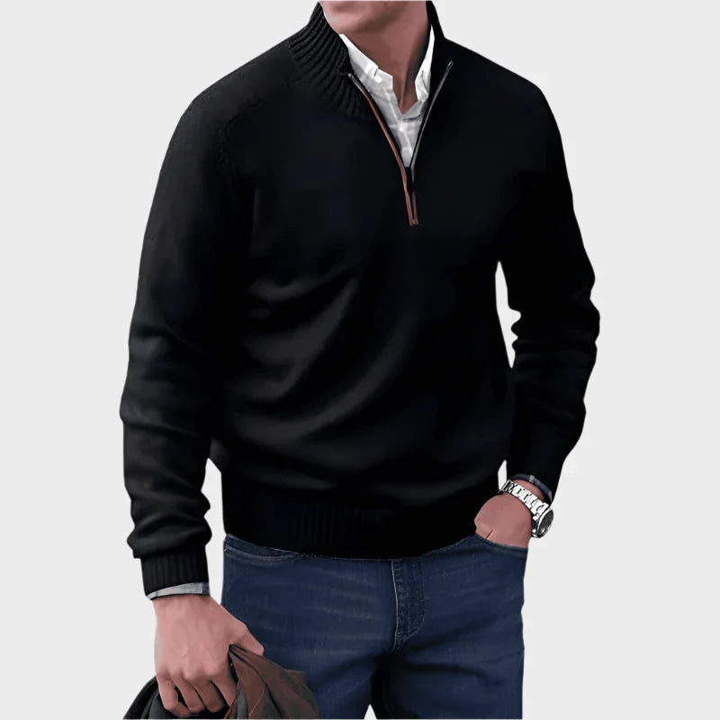 Black half-zip knit sweater with ribbed collar, cuffs, and hem.