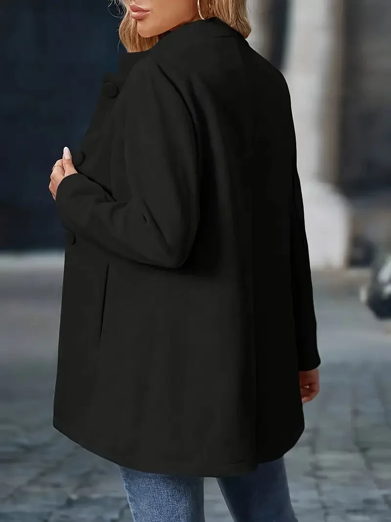 Black blazer jacket, back view, long sleeves and button detailing at cuffs