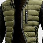 Men's puffer jacket chest close-up: green quilted body, zip pocket and stand collar