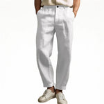 White summer pants with button waistband, tapered ankle-length cuffs