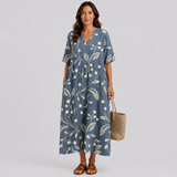 Women's blue floral short-sleeve midi dress with V-neck, linen-like weave