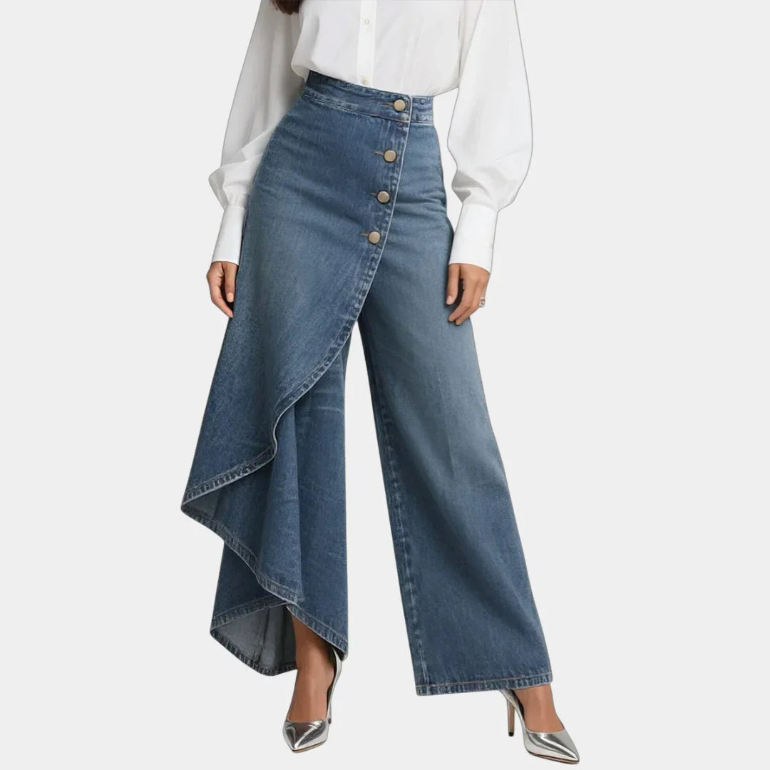 High-waisted wide-leg jeans in medium blue wash, button front and draped side hem