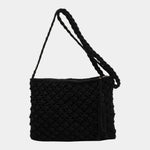Black woven shoulder bag with textured front and braided strap