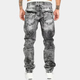 Gray stretch jeans with belt loops, button fly, and coin-pocket details at back
