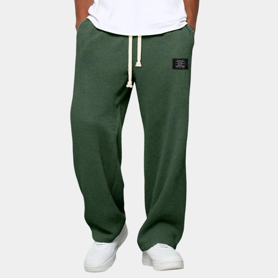 Men's drawstring pants, relaxed fit, textured dark green fabric