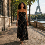 Black long maxi dress with spaghetti straps and gold diamond lattice pattern