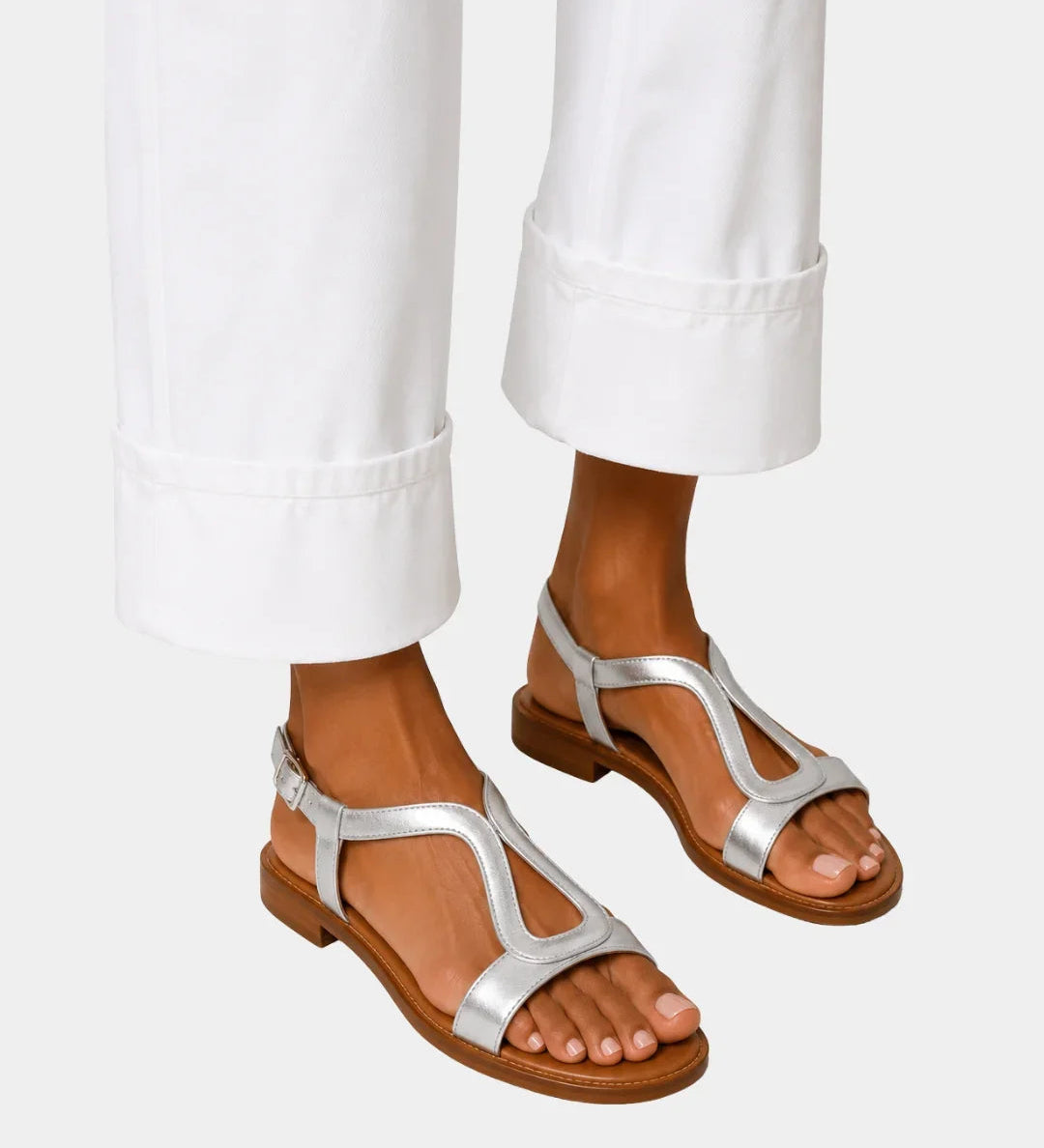 Silver T-strap open-toe sandals with low block heel and ankle strap