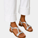 Silver T-strap open-toe sandals with low block heel and ankle strap