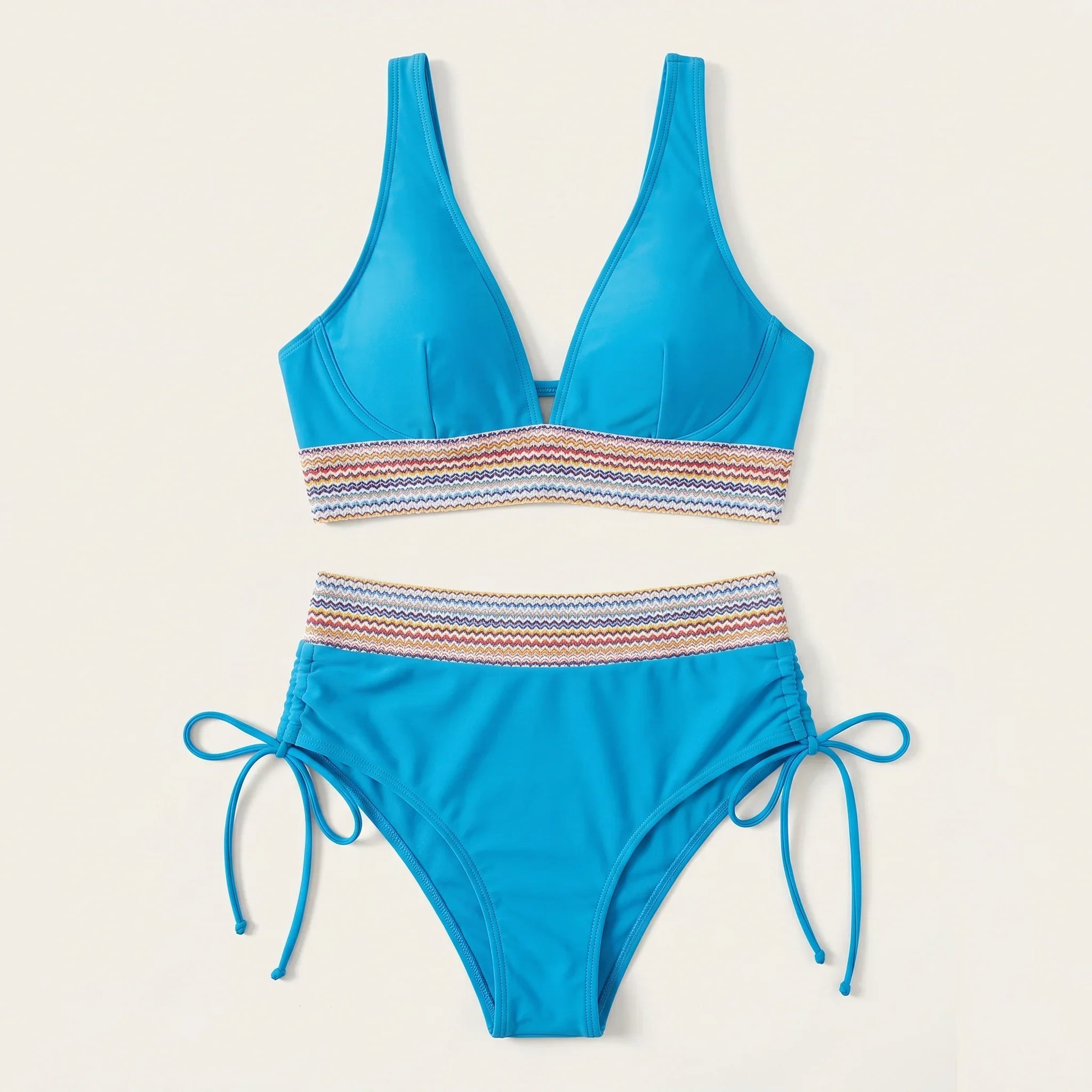 Blue-green two-piece swimsuit: V-neck top with striped band, tie-side bikini bottoms