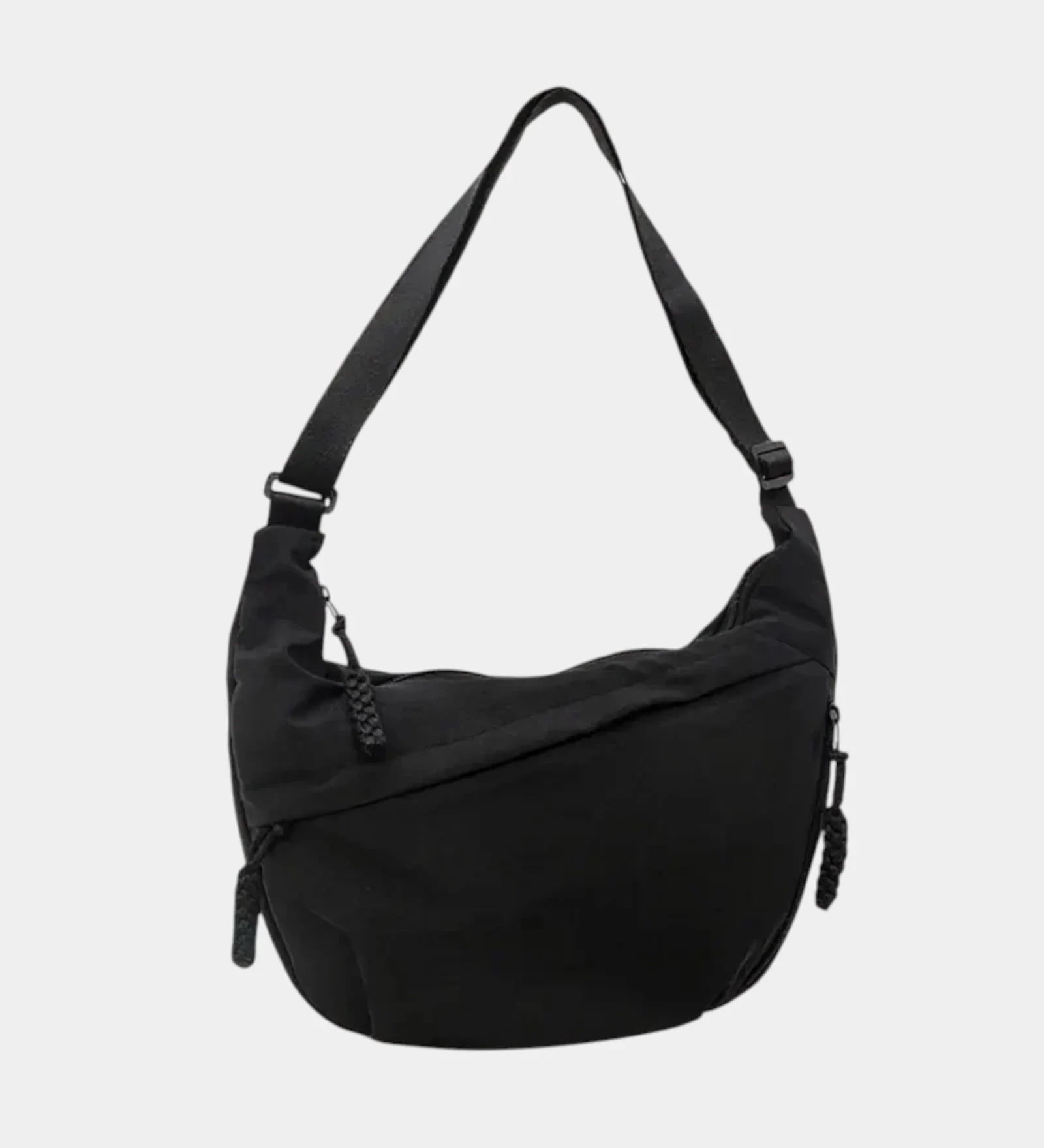 Black anti-theft crossbody bag, curved hobo shape with adjustable strap and zipper pull.