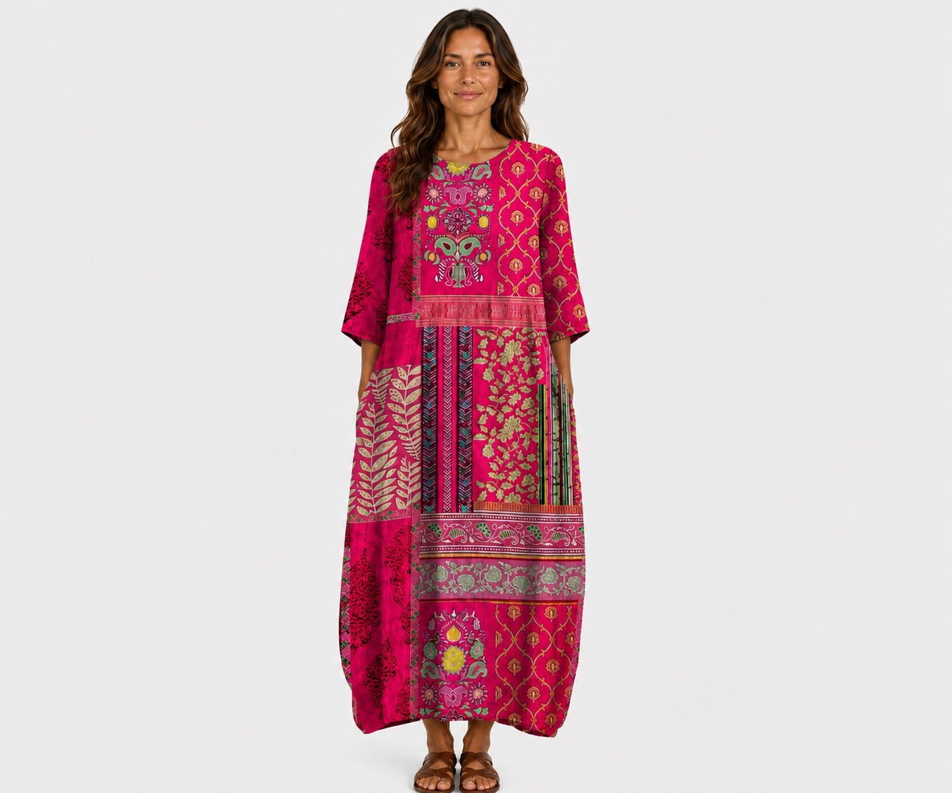 Long magenta printed dress with three-quarter sleeves and patterned border hem