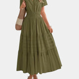 Olive green tiered maxi dress with V-neck, short sleeves, and gathered waist