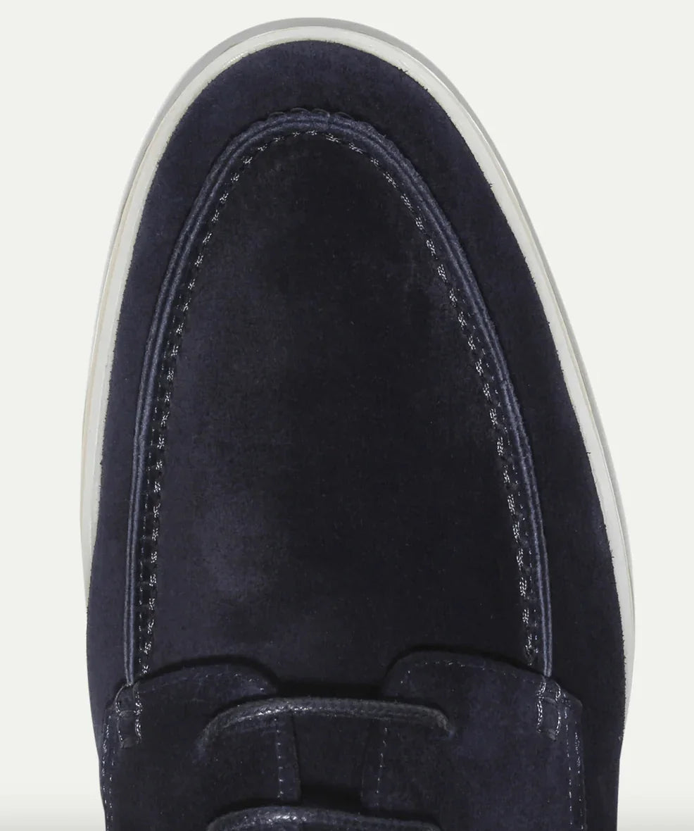 Navy blue suede loafer toe with contrast stitching detail