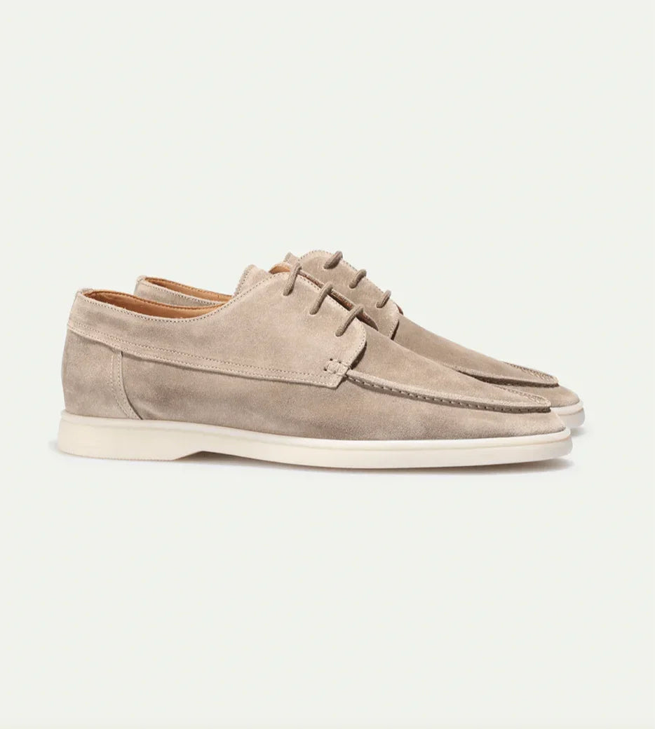 Light beige suede lace-up loafers, side profile with white sole