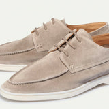 Light beige suede lace-up loafers with stitched seams and low white sole