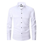 White long-sleeve button-up shirt with spread collar and black buttons