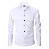 White long-sleeve button-up shirt with spread collar and black buttons