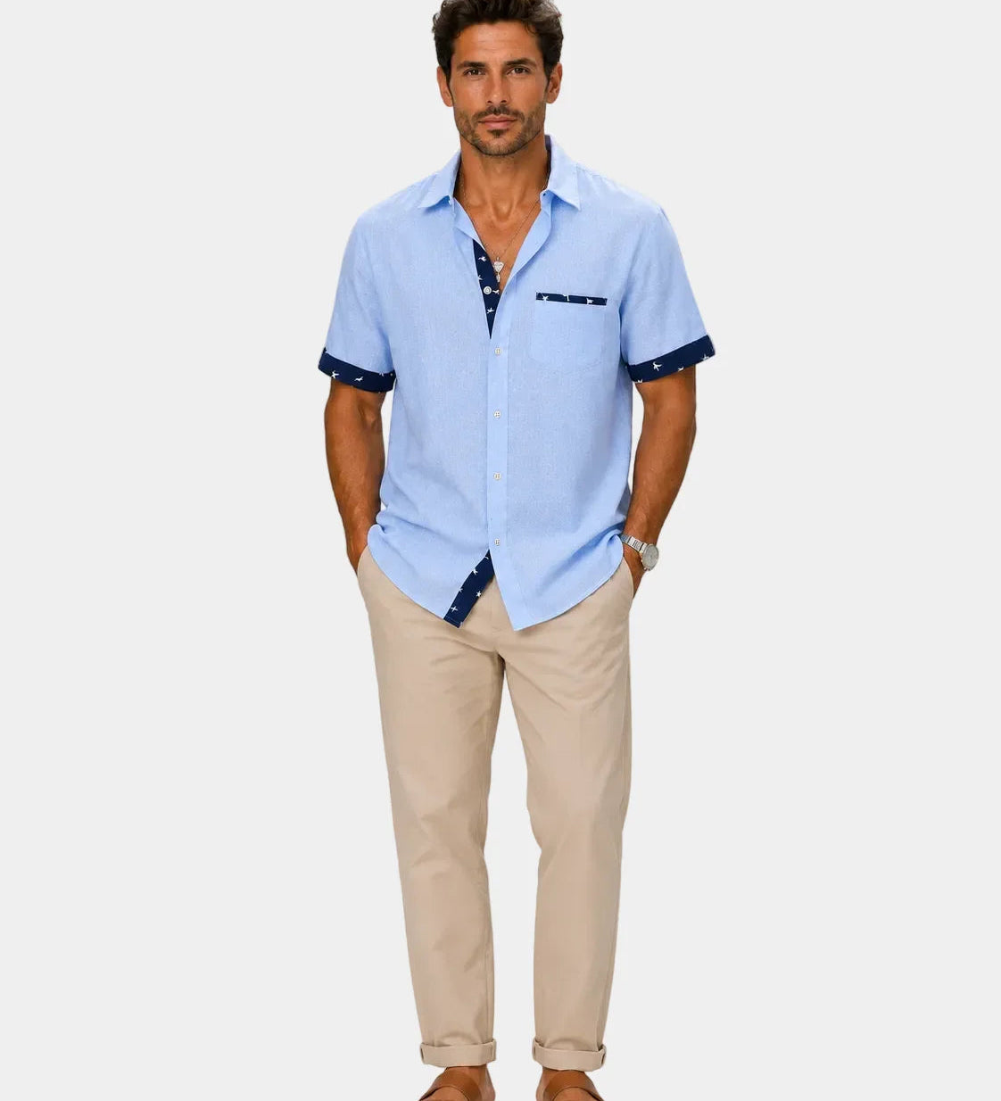 Blue short-sleeve button-up shirt with chest pocket and dark-trim cuffs