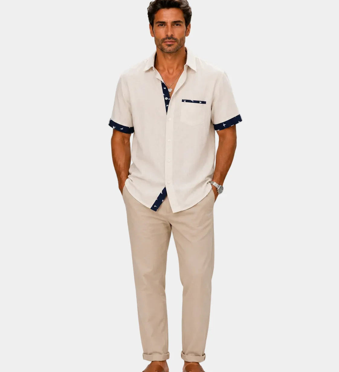 Light cream short-sleeve button-up shirt with chest pocket and dark trim at cuffs