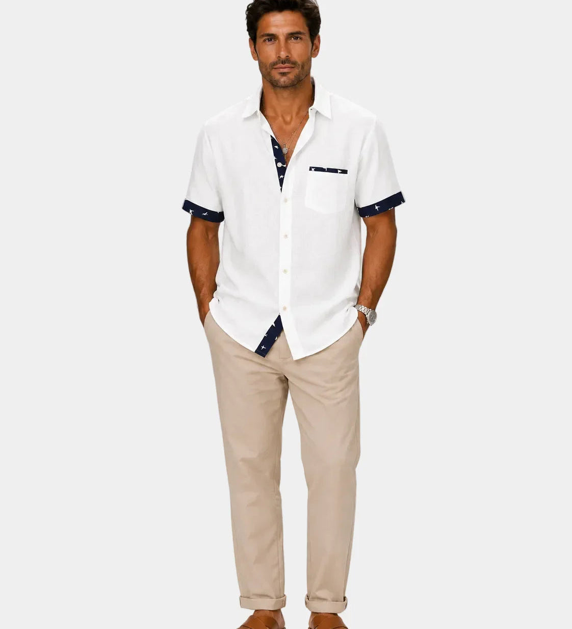 White short-sleeve button-up shirt with chest pocket and dark trim on cuffs