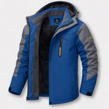 Blue winter jacket with gray panels, black inner fleece, and hooded collar