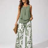 Petronila sage green sleeveless layered top and wide-leg leaf print pants set
