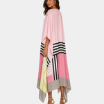 Pink draped dress with multicolor blocks and black striped hem panel