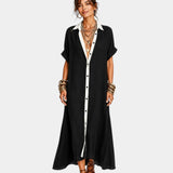 Black shirt-inspired button front dress with short sleeves and pointed collar