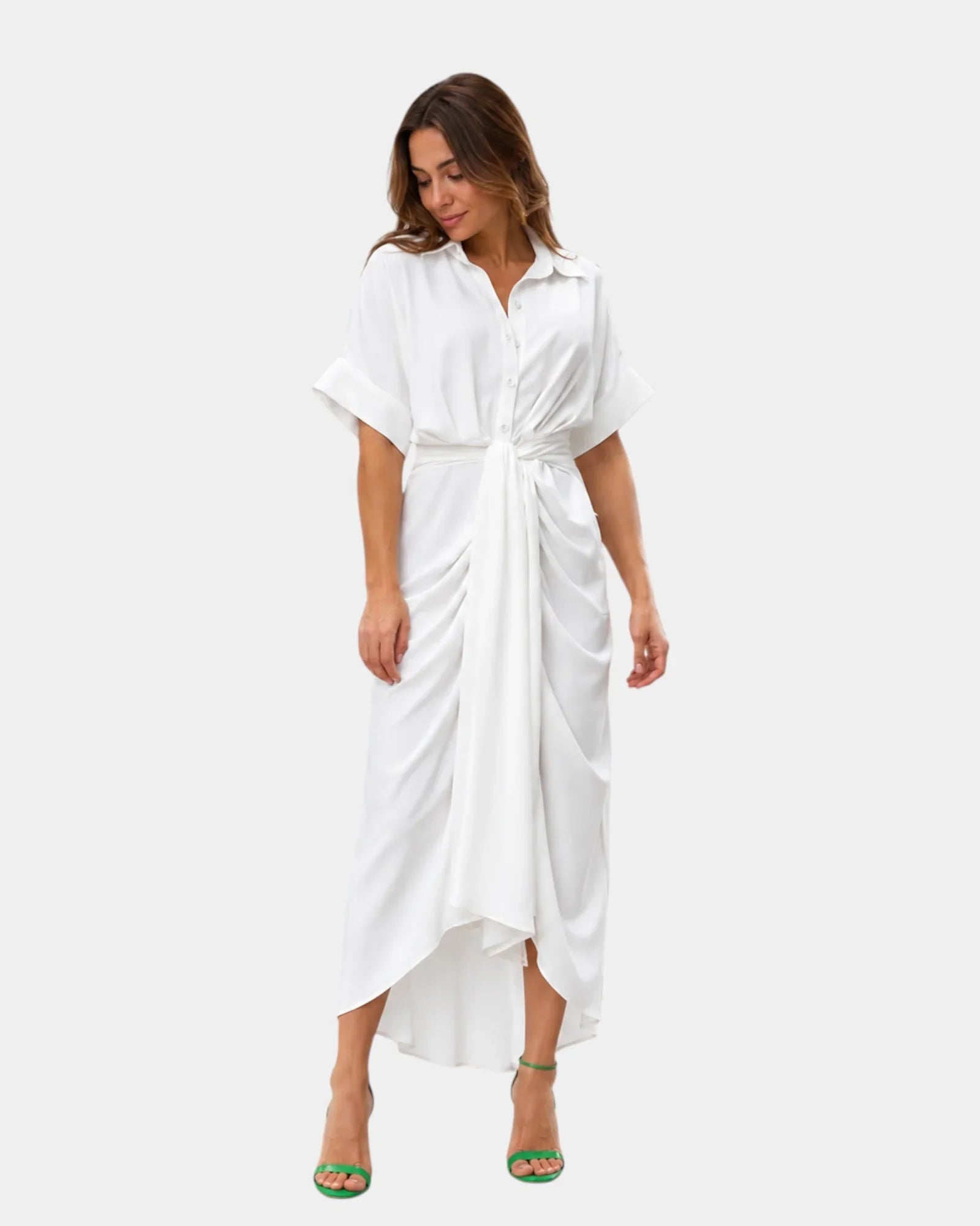 White casual dress with short sleeves, button front, and tied waist sash, asymmetrical hem