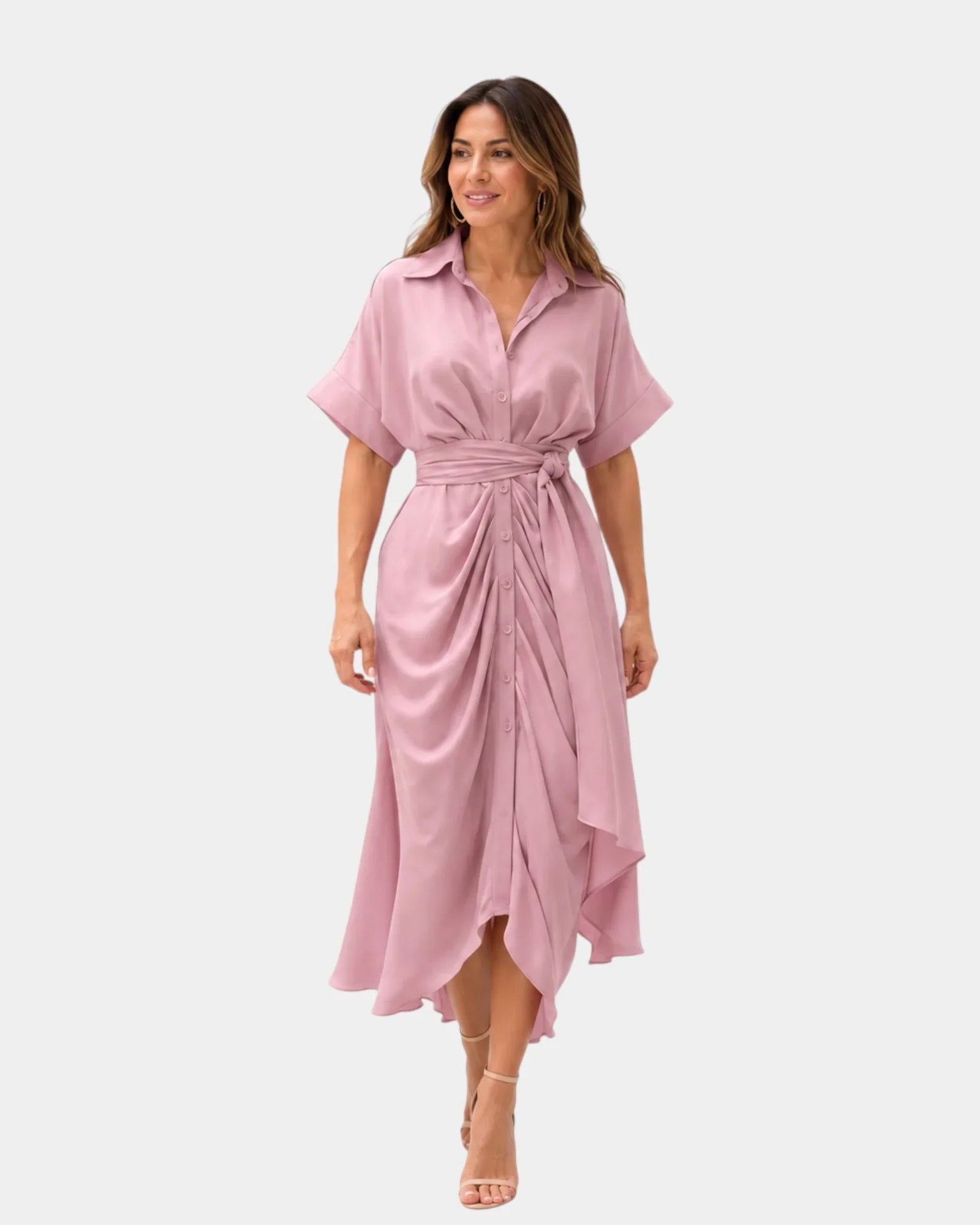 Light pink casual dress with short sleeves, button front, and tied waist sash