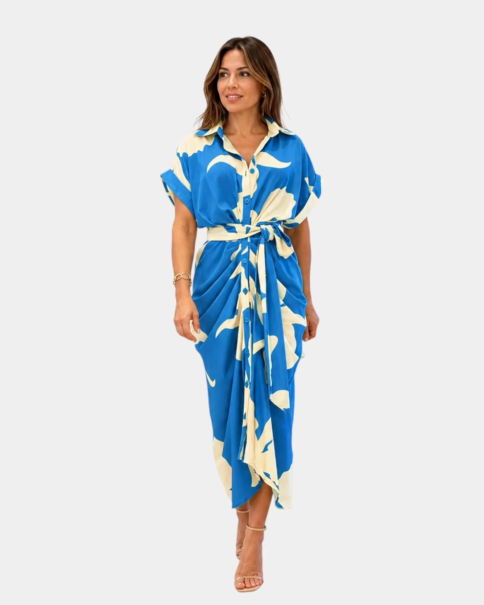 Blue patterned casual dress with short sleeves, button front, and tied waist belt
