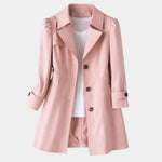 Pink vintage-style coat with notched lapels, button front, and cuffed 3/4 sleeves