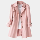 Pink vintage-style coat with notched lapels, button front, and cuffed 3/4 sleeves