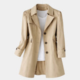 Khaki vintage-style coat with notched lapels, button front, and cuffed 3/4 sleeves