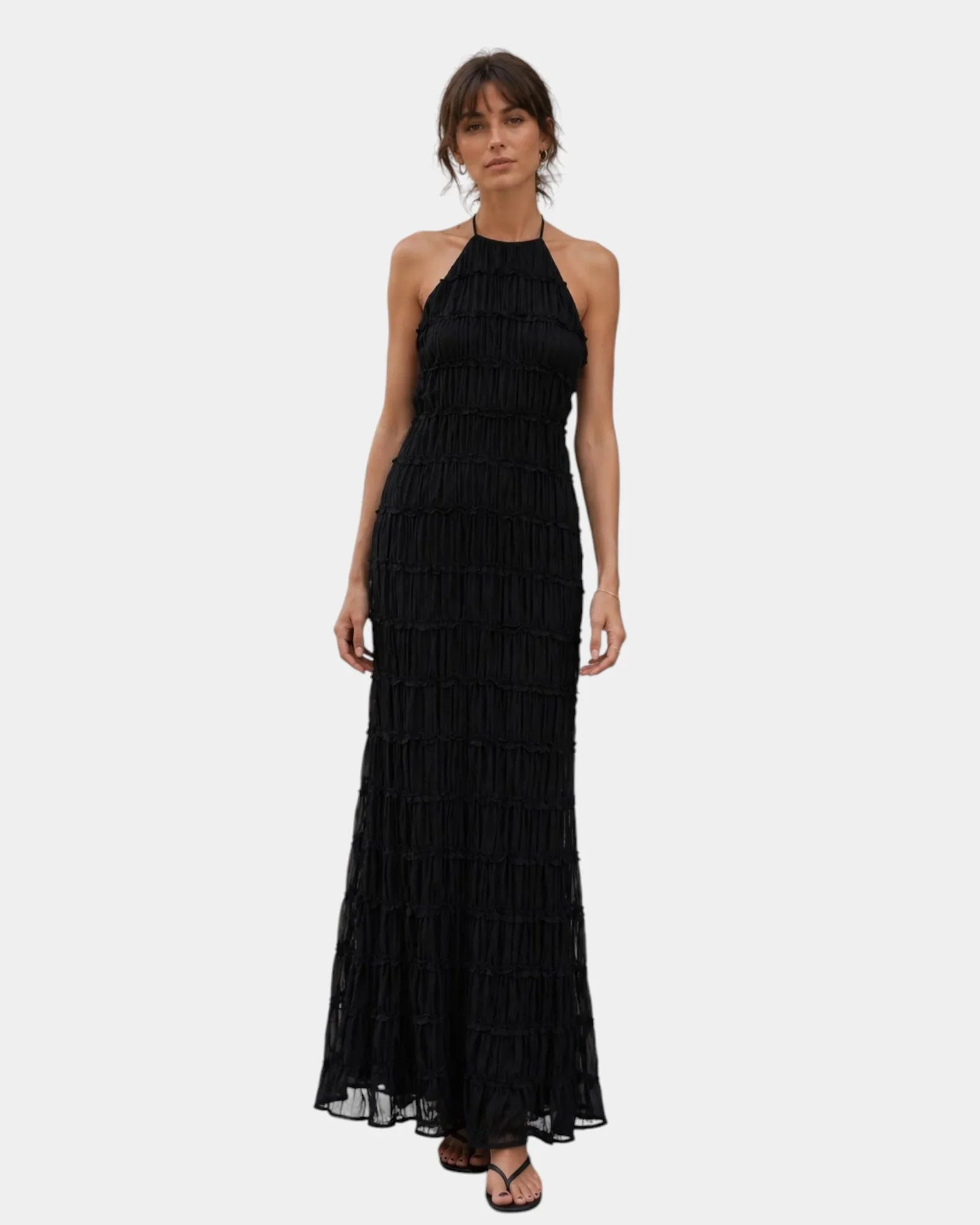 Long summer dress in black with halter neck and tiered ruffles