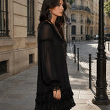 Black sheer sleeve short dress with V-neck and layered ruffle trim hem