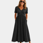 Black V-neck wrap dress with crossed bodice and short sleeves