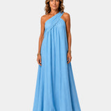 Blue crossed maxi dress, sleeveless one-shoulder draped bodice, flowing maxi skirt