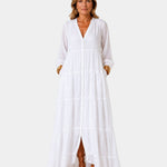 White tiered maxi dress with V-neck, button front, long sleeves, and side slit